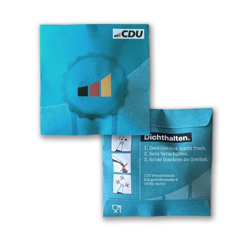 Verpackungstütchen aus Papier für den Flaschenverschluss. Abbildung der Vorder- und Rückseite ganz in Türkis. Textaufdruck: Dichthalten.
