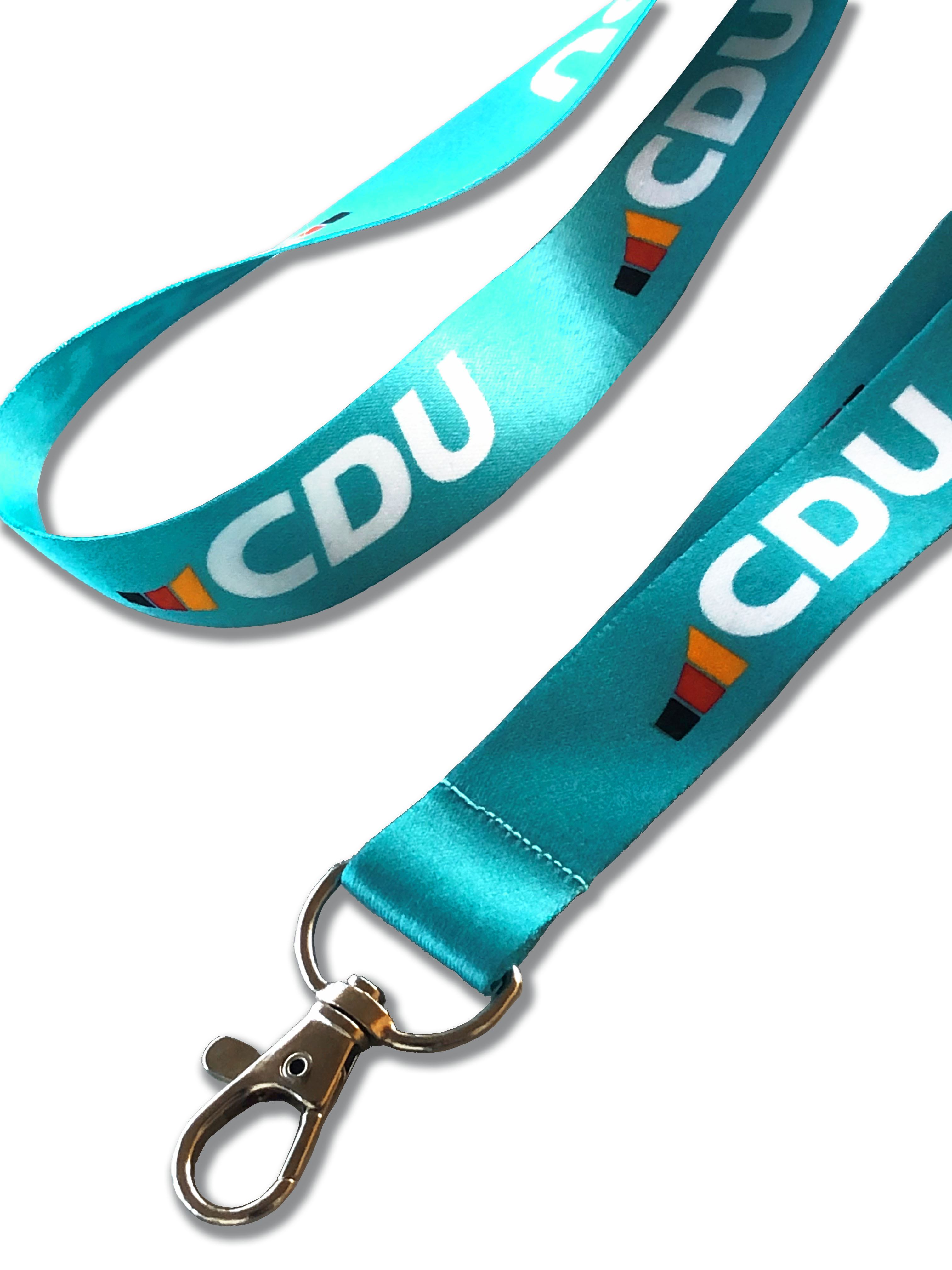 Gleiches gewebtes Umhängeband in Türkis mit Karabiner als Anhänger. Bedruckung mit CDU-Logos fortlaufend, nebeneinander.