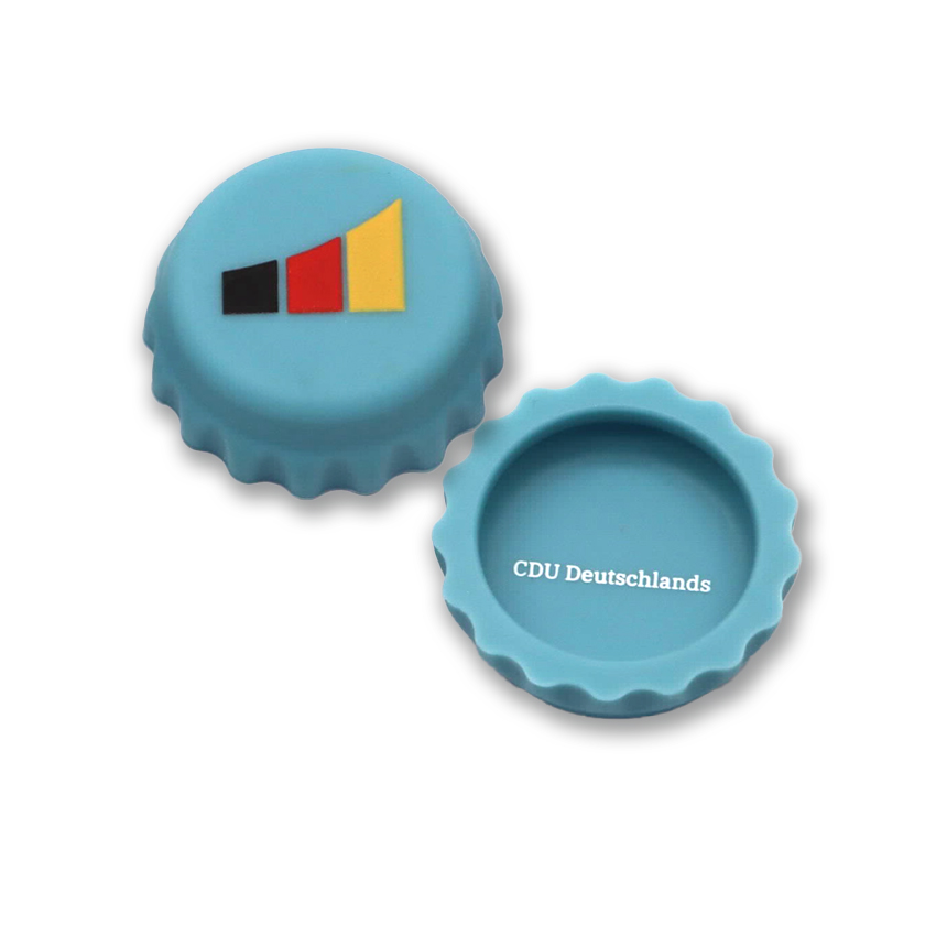 Flaschenverschluss aus türkisfarbigem Silikon. Aufdruck 3-farbiger Bogen. Innendruck: CDU Deutschlands in Weiß.